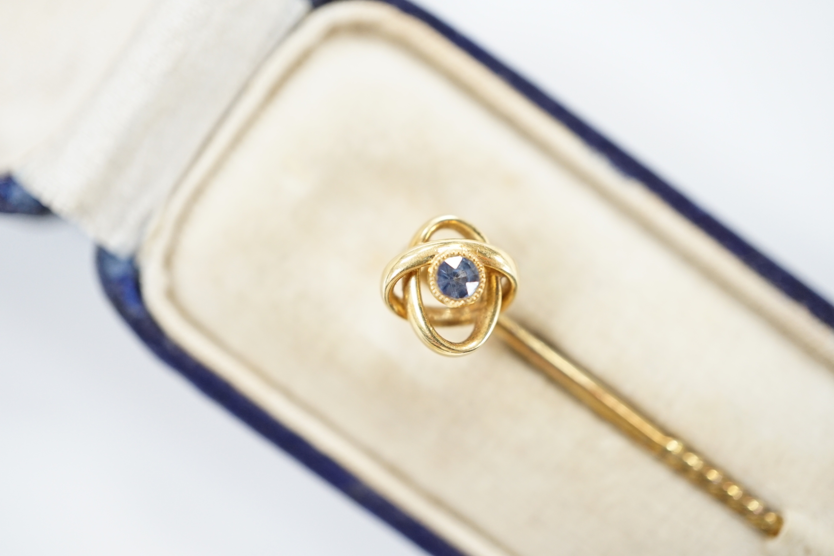 An Edwardian 15ct, sapphire and diamond set three stone bar brooch, 48mm, a later 14ct gold enamel and baroque pearls set 'Kingfisher' bar brooch, one other yellow metal and seed pearl set brooch and an Edwardian 15ct an